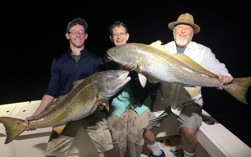 An image of monster redfish caught on board a Tidewater Chesapeake Bay Fishing Charters adventure. 